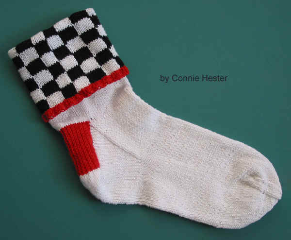 Hand Knit Socks Pattern with Intarsia-Knit Black and White Checkerboard Cuff and Contrasting Heel by Connie Hester